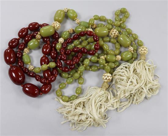 Three assorted simulated amber bead necklaces.